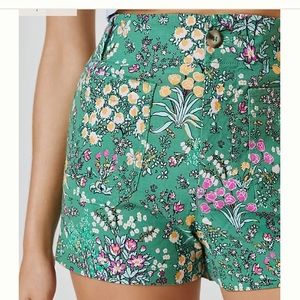 The Colette shorts Maeve Anthropologie green floral patch pockets sailor style